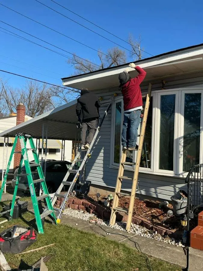 Restoration crew performing exterior repair in Preston